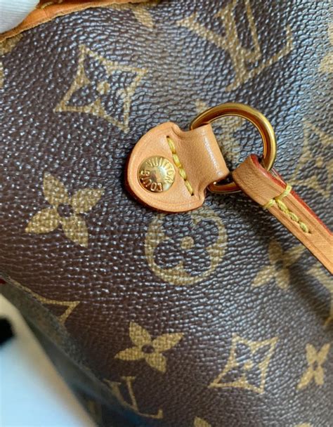lv coin bag fake